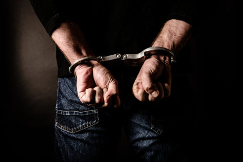 Criminal-With-Handcuf.jpg